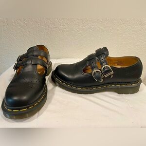 Black leather strap penny loafers